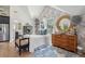Inviting bedroom with elegant wallpaper and a bright, natural light, with an ensuite bathroom at 3871 Sawyers Island Dr, Mount Pleasant, SC 29466