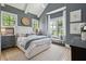 Charming primary bedroom with large windows, high ceilings, and neutral decor at 3871 Sawyers Island Dr, Mount Pleasant, SC 29466