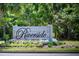 Riverside at Carolina Park community sign surrounded by lush landscaping and colorful flowers at 3871 Sawyers Island Dr, Mount Pleasant, SC 29466