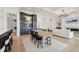 Open concept dining room and living room with coffered ceilings and elegant decor at 3871 Sawyers Island Dr, Mount Pleasant, SC 29466