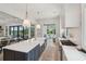Spacious kitchen featuring a large island, pendant lights, and stainless steel appliances at 3871 Sawyers Island Dr, Mount Pleasant, SC 29466