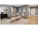 Comfortable living room with a large sectional sofa and decoratively framed pictures at 3871 Sawyers Island Dr, Mount Pleasant, SC 29466