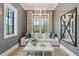 Bright and cozy living room with shiplap walls, modern lighting, and stylish decor at 3871 Sawyers Island Dr, Mount Pleasant, SC 29466