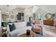 Open living space combining a modern kitchen and a comfortable living area with a neutral color palette at 3871 Sawyers Island Dr, Mount Pleasant, SC 29466