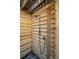 Rustic outdoor shower featuring wood slat walls, providing privacy and a natural feel at 3871 Sawyers Island Dr, Mount Pleasant, SC 29466
