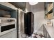 Walk-in pantry features a built-in microwave and refrigerator, plus tile flooring at 3871 Sawyers Island Dr, Mount Pleasant, SC 29466