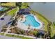 Resort-style pool area with lush landscaping and ample seating, perfect for relaxation and recreation at 3871 Sawyers Island Dr, Mount Pleasant, SC 29466