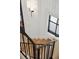 Bright foyer and staircase with wooden steps and modern iron railing at 3871 Sawyers Island Dr, Mount Pleasant, SC 29466
