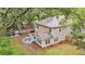 Aerial view of the backyard featuring mature trees, outdoor seating area, and playground at 3873 Hanoverian Dr, Mount Pleasant, SC 29429