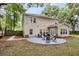 Backyard area with patio and a dining set at 3873 Hanoverian Dr, Mount Pleasant, SC 29429