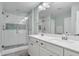 Bathroom with a double vanity, large mirror, and walk-in shower at 3873 Hanoverian Dr, Mount Pleasant, SC 29429