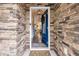 Front door with stone surround opening to a view of the home's living area at 3873 Hanoverian Dr, Mount Pleasant, SC 29429