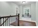 Hallway featuring wood floors, wainscotting and a window bench at 3873 Hanoverian Dr, Mount Pleasant, SC 29429