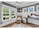Bright office featuring wainscoting, multiple windows, and custom desk at 3873 Hanoverian Dr, Mount Pleasant, SC 29429