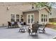 Spacious patio perfect for outdoor entertaining, featuring a fire pit and dining area at 3873 Hanoverian Dr, Mount Pleasant, SC 29429