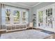 Sunlit playroom with large windows, storage bins, and access to the outdoors at 3873 Hanoverian Dr, Mount Pleasant, SC 29429