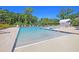 Community pool featuring clear water, lounge chairs, and mature landscaping around the pool area at 3873 Hanoverian Dr, Mount Pleasant, SC 29429