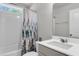 Stylish bathroom featuring a shower/tub combo, single sink vanity, and neutral color palette at 404 Bowstring Dr, Huger, SC 29450