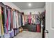 Walk-in closet with abundant hanging space and upper shelves provides ample room for wardrobe storage at 404 Bowstring Dr, Huger, SC 29450