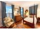 Cozy bedroom with hardwood floors, stylish furnishings, and natural light at 4150 Nature View Cir, Johns Island, SC 29455