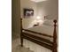 Cozy bedroom featuring a wooden bed frame and artwork of a horse on the wall at 4150 Nature View Cir, Johns Island, SC 29455