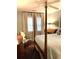 Inviting bedroom with a four-poster bed, classic decor, and soft, natural lighting at 4150 Nature View Cir, Johns Island, SC 29455