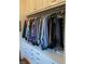 Well-organized closet space with built-in drawers, upper cabinets, and hanging rods for optimal storage at 4150 Nature View Cir, Johns Island, SC 29455