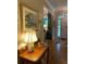 Charming foyer with hardwood floors, a decorative table, and elegant decor at 4150 Nature View Cir, Johns Island, SC 29455