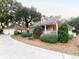 Beautiful house with a spacious driveway, attached garage, and lush green surroundings at 4150 Nature View Cir, Johns Island, SC 29455