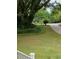 Green grass yard featuring mature trees and lush landscaping at 4150 Nature View Cir, Johns Island, SC 29455
