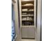 Organized pantry with open shelving and cabinets, perfect for storing linens and household items at 4150 Nature View Cir, Johns Island, SC 29455