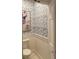 Stylish powder room with patterned wallpaper, framed art, and classic fixtures at 4150 Nature View Cir, Johns Island, SC 29455