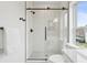 Sleek bathroom features a glass-enclosed shower, white subway tile, and modern fixtures at 42 Poinsett St # B, Charleston, SC 29403