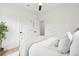 Bedroom featuring light hardwood floors, ceiling fan and a woven throw at 42 Poinsett St # B, Charleston, SC 29403