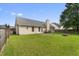 Expansive backyard highlighting the outdoor space, grassy area, and privacy fencing, ideal for relaxation and recreation at 432 Equinox Cir, Ladson, SC 29456