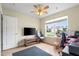 Cozy bedroom includes a ceiling fan and built-in storage at 432 Equinox Cir, Ladson, SC 29456