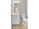 Cozy bathroom featuring a white vanity, neutral walls, and a toilet at 434 Antebellum Ln, Mount Pleasant, SC 29464