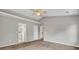 Spacious bedroom with neutral walls and carpet, showcasing doorways at 434 Antebellum Ln, Mount Pleasant, SC 29464
