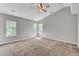Bright bedroom featuring vaulted ceiling, three windows and plush carpet at 434 Antebellum Ln, Mount Pleasant, SC 29464