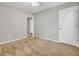 This bedroom has neutral walls, carpet flooring and a white door at 434 Antebellum Ln, Mount Pleasant, SC 29464