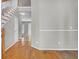 Inviting entryway showcasing hardwood floors and a staircase leading to the upper level at 434 Antebellum Ln, Mount Pleasant, SC 29464