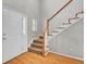 Inviting entryway featuring hardwood floors and a staircase leading to the upper level at 434 Antebellum Ln, Mount Pleasant, SC 29464