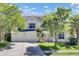 Charming two-story home with a well-maintained lawn, two-car garage, and welcoming curb appeal at 434 Antebellum Ln, Mount Pleasant, SC 29464