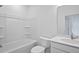 Clean bathroom with a tub shower, and a vanity with stone countertop at 4436 Oakwood Ave, North Charleston, SC 29405