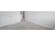 Cozy bedroom with plush carpet and access to hall, creating a welcoming space at 4436 Oakwood Ave, North Charleston, SC 29405