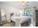Comfortable bedroom featuring a ceiling fan and view of the outdoor scenery at 512 Castle Hall Rd, Mount Pleasant, SC 29464