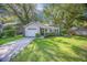 Charming single-Gathering home with lush landscaping, and a well-maintained lawn at 512 Castle Hall Rd, Mount Pleasant, SC 29464