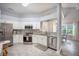 Bright kitchen featuring stainless steel appliances, granite countertops, and white cabinets at 512 Castle Hall Rd, Mount Pleasant, SC 29464