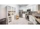Well-equipped kitchen with stainless steel appliances, white cabinets, and breakfast area at 512 Castle Hall Rd, Mount Pleasant, SC 29464