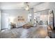 Spacious living room with vaulted ceilings, modern ceiling fan, and comfortable seating area at 512 Castle Hall Rd, Mount Pleasant, SC 29464
